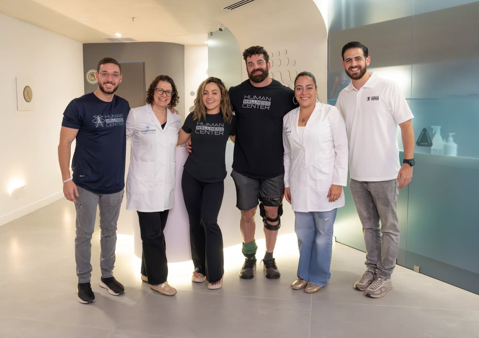 Brian Cage and Melissa Santos with the Human Wellness Center team