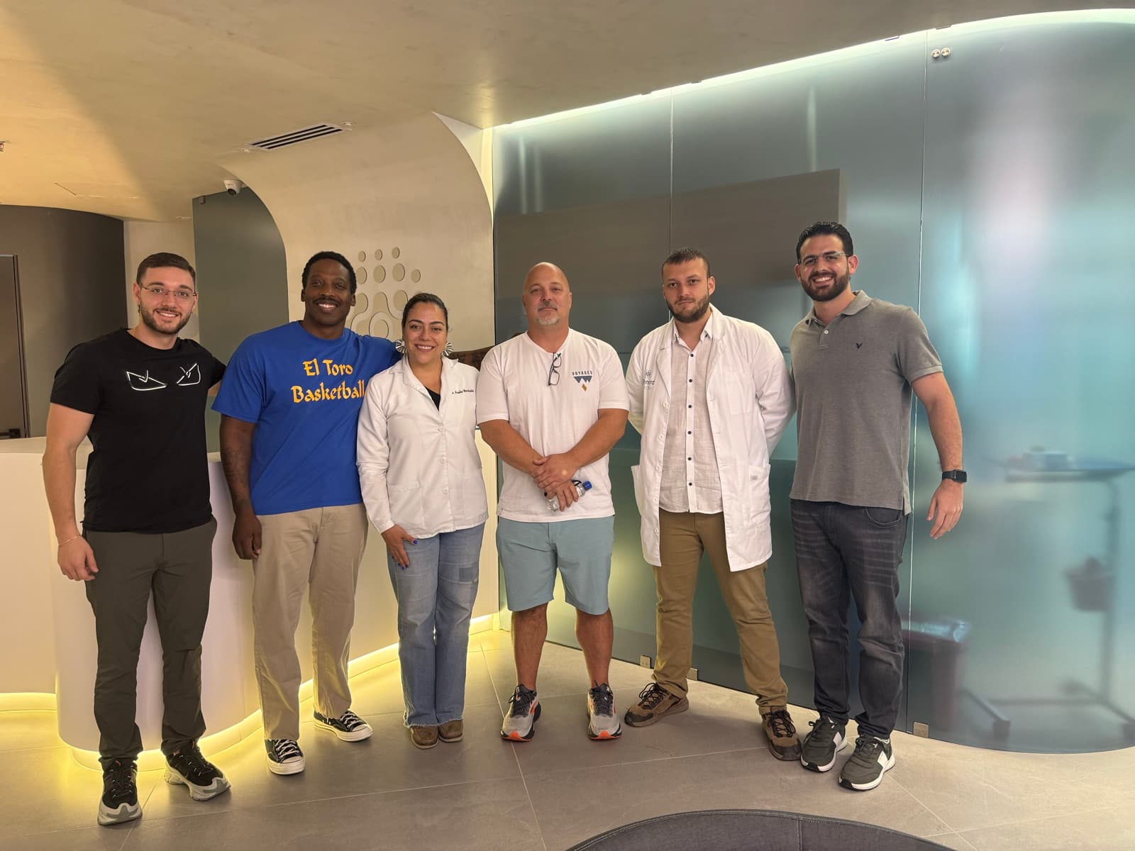 Patients and guests with the care team in the Human Wellness Center lobby